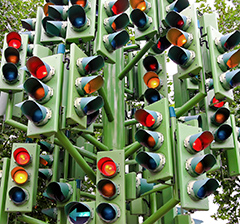 a complex array of about 40 traffic lights pointing in various directions